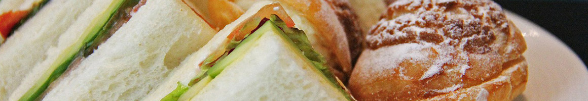 Eating Sandwich at Triple Dip Lodge restaurant in Milbank, SD.